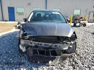 2018 Ford Focus SE with VIN 1FADP3F2XJL254344, listed as a Copart auction lot 54663115 with 84,850 mi miles and Salvage title. Bid and sale history available at DreamBid. Image 5.