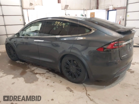 2016 Tesla Model X 70D with VIN 5YJXCBE2XGF025303, listed as a IAAI auction lot 41558869 with 77,793 mi miles and . Bid and sale history available at DreamBid. Image 3.