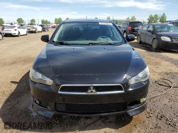 2009 Mitsubishi Lancer z VIN JA3AX88W99U613116, wystawiony jako Copart lot #58765855 z przebiegiem 256 289 mil mil oraz Czysty tytuł • Clean title. Historia ofert i sprzedaży dostępna na DreamBid. Obrazek 5.