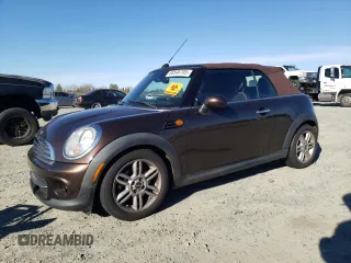 2012 MINI Convertible with VIN WMWZN3C55CT133967, listed as a Copart auction lot 88546705 with 104,357 mi miles and Non Repairable. Bid and sale history available at DreamBid. Image 1.