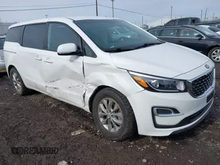 2021 Kia Sedona LX with VIN KNDMB5C13M6668648, listed as a IAAI auction lot 41785324 with 52,301 mi miles. Bid and sale history available at carsss.com. Image 1.