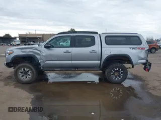 2017 Toyota Tacoma SR5 with VIN 3TMCZ5AN8HM051829, listed as a IAAI auction lot 41616329 with 64,113 mi miles and . Bid and sale history available at DreamBid. Image 14.