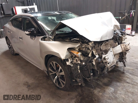 2016 Nissan Maxima SV z VIN 1N4AA6AP4GC415952, wystawiony jako IAAI lot #41806306 z przebiegiem 131 612 mil mil oraz . Historia ofert i sprzedaży dostępna na DreamBid. Obrazek 1.