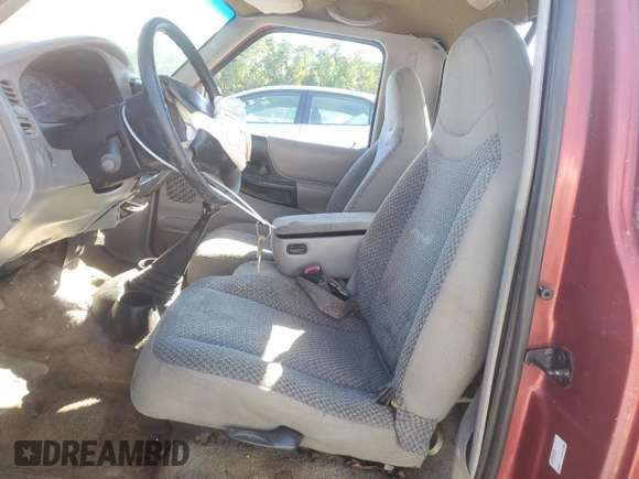 1998 Ford Ranger XL z VIN 1FTYR10U0WUA32708, wystawiony jako Copart lot #52278275 z przebiegiem 230 249 mil mil oraz Szkoda całkowita • Salvage title. Historia ofert i sprzedaży dostępna na DreamBid. Obrazek 7.