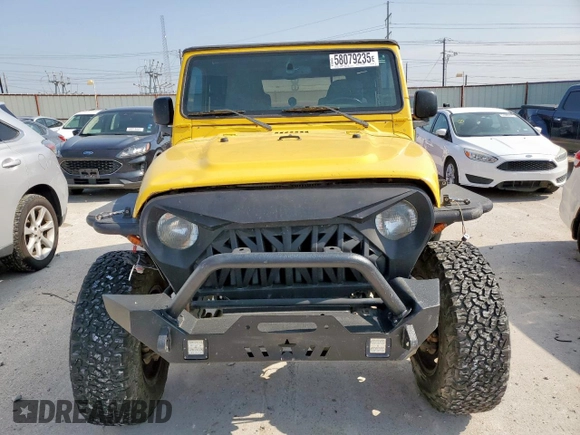 2003 Jeep Wrangler Sport with VIN 1J4FA49S43P369906, listed as a Copart auction lot 58079235 with 139,547 mi miles and Salvage title. Bid and sale history available at DreamBid. Image 5.