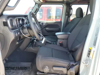 2023 Jeep Wrangler Sport S with VIN 1C4HJXDG5PW623797, listed as a Copart auction lot 66359625 with 16,518 mi miles and Salvage title. Bid and sale history available at DreamBid. Image 7.