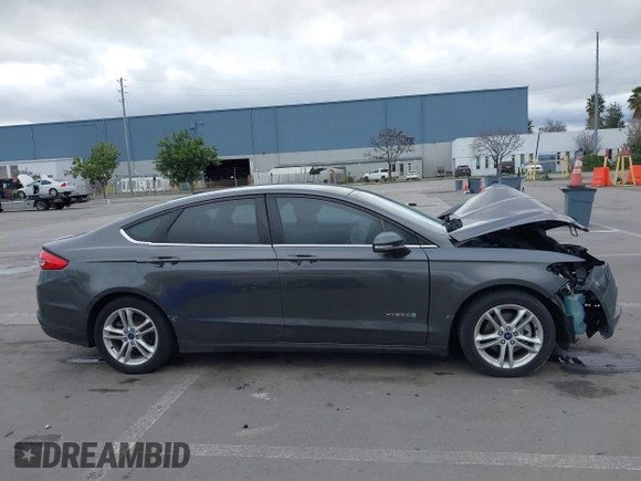 2018 Ford Fusion SE z VIN 3FA6P0LU8JR195096, wystawiony jako IAAI lot #41494088 z przebiegiem 114 007 mil mil oraz . Historia ofert i sprzedaży dostępna na DreamBid. Obrazek 14.