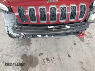 2016 Jeep Cherokee Trailhawk with VIN 1C4PJMBBXGW135138, listed as a IAAI auction lot 41595718 with 267,058 mi miles and . Bid and sale history available at DreamBid. Image 6.