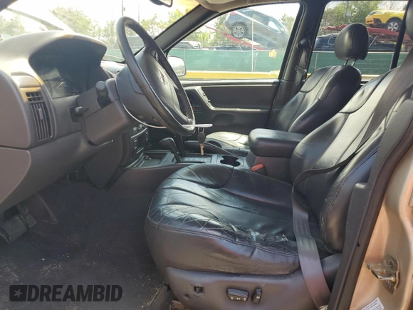2001 Jeep Grand Cherokee Laredo z VIN 1J4GW48S61C537640, wystawiony jako Copart lot #58266135 z przebiegiem 188 475 mil mil oraz Szkoda całkowita • Salvage title. Historia ofert i sprzedaży dostępna na DreamBid. Obrazek 7.