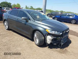 2016 Ford Fusion Titanium с VIN 3FA6P0K98GR158877, выставлен на аукционе IAAI как лот 41994013 с пробегом 57 027 миль миль и . История ставок и продаж доступна на DreamBid. Изображение 1.
