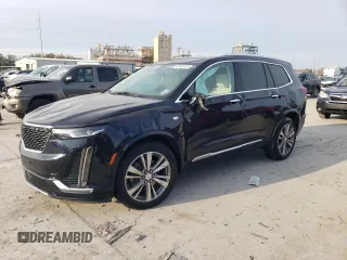 2022 Cadillac XT6 Premium Luxury with VIN 1GYKPDRS5NZ107333, listed as a Copart auction lot 42582515 with 51,371 mi miles and Salvage Title. Bid and sale history available at carsss.com. Image 1.