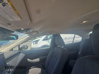 2024 Toyota Corolla LE with VIN 5YFB4MDE6RP133424, listed as a IAAI auction lot 42852869 with 25,073 mi miles and . Bid and sale history available at DreamBid. Image 7.
