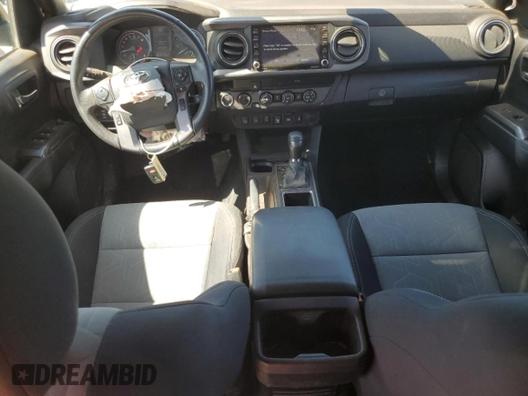 2020 Toyota Tacoma SR5 with VIN 3TMDZ5BN3LM087312, listed as a Copart auction lot 57876405 with 49,201 mi miles and Salvage title. Bid and sale history available at DreamBid. Image 8.