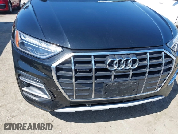 2021 Audi Q5 Premium Plus z VIN WA1BAAFY7M2114476, wystawiony jako IAAI lot #42063790 z przebiegiem 44 945 mil mil oraz . Historia ofert i sprzedaży dostępna na DreamBid. Obrazek 17.