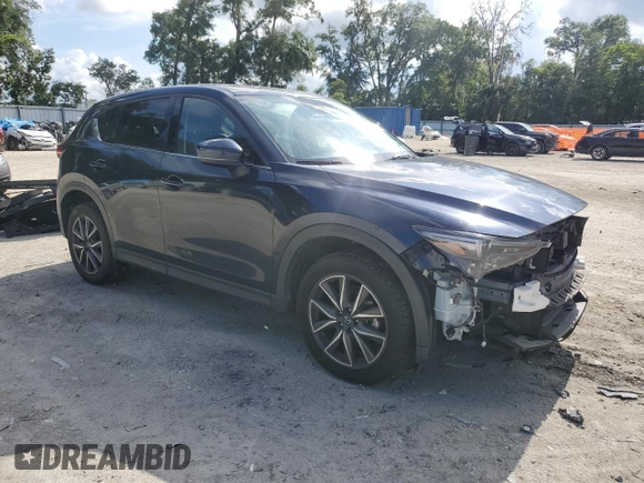 2018 Mazda CX-5 Grand Touring with VIN JM3KFBDMXJ0350499, listed as a Copart auction lot 63475745 with 119,642 mi miles and Salvage title. Bid and sale history available at DreamBid. Image 4.