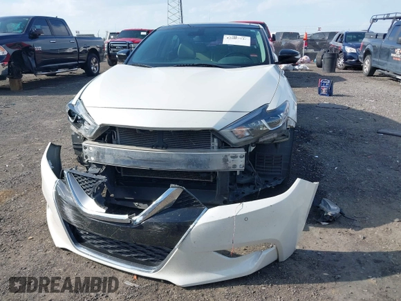 2016 Nissan Maxima SV z VIN 1N4AA6AP9GC431466, wystawiony jako IAAI lot #42007934 z przebiegiem 263 333 mil mil oraz . Historia ofert i sprzedaży dostępna na DreamBid. Obrazek 12.