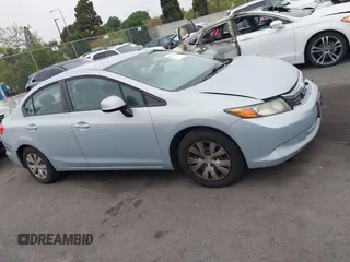 2012 Honda Civic LX with VIN 2HGFB2F58CH560126, listed as a IAAI auction lot 42097094 with 149,921 mi miles and . Bid and sale history available at DreamBid. Image 13.