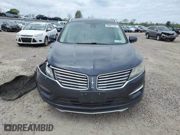 2015 Lincoln MKC z VIN 5LMTJ2AH9FUJ03616, wystawiony jako Copart lot #56681155 z przebiegiem 95 055 mil mil oraz Szkoda całkowita • Salvage title. Historia ofert i sprzedaży dostępna na DreamBid. Obrazek 5.