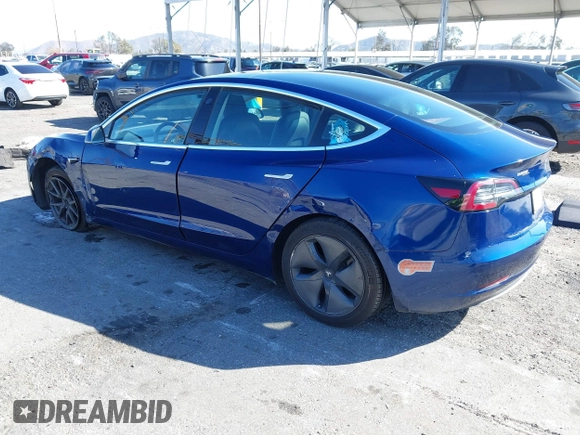 2019 Tesla Model 3 Mid Range with VIN 5YJ3E1EA8KF436086, listed as a IAAI auction lot 41682093 with 70,332 mi miles and . Bid and sale history available at DreamBid. Image 3.