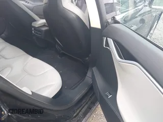 2013 Tesla Model S с VIN 5YJSA1DG7DFP26402, выставлен на аукционе IAAI как лот 42195726 с пробегом 100 890 миль миль и . История ставок и продаж доступна на DreamBid. Изображение 8.
