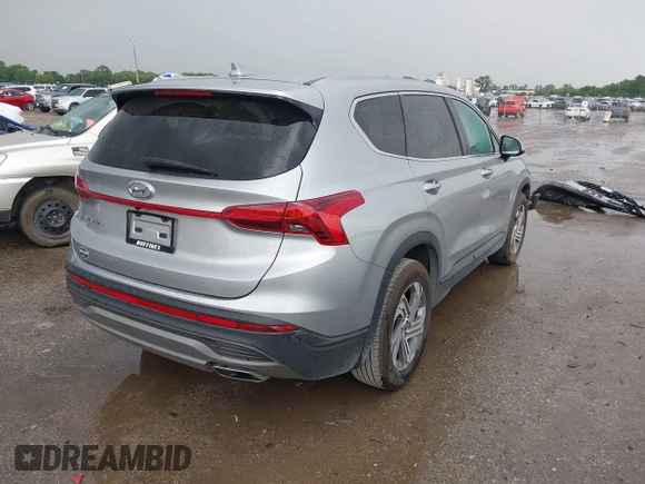 2023 Hyundai Santa Fe SE with VIN 5NMS14AJ5PH626769, listed as a IAAI auction lot 42637931 with 10,712 mi miles and . Bid and sale history available at DreamBid. Image 4.