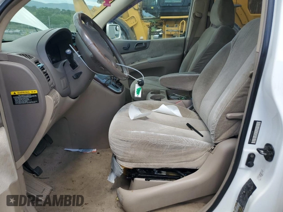 2006 Kia Sedona LX with VIN KNDMB233366052094, listed as a Copart auction lot 58241074 with 181,295 mi miles and Salvage Title. Bid and sale history available at carsss.com. Image 7.