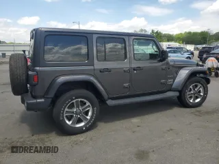 2019 Jeep Wrangler Unlimited Sahara with VIN 1C4HJXEN1KW504490, listed as a Copart auction lot 55633055 with 81,444 mi miles and Salvage Title. Bid and sale history available at DreamBid. Image 3.