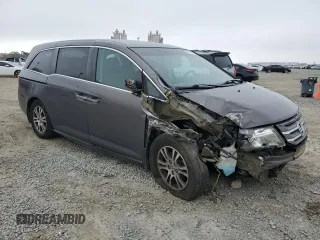 2011 Honda Odyssey EX with VIN 5FNRL5H46BB070299, listed as a Copart auction lot 50550385 with 167,544 mi miles and Salvage Title. Bid and sale history available at carsss.com. Image 4.