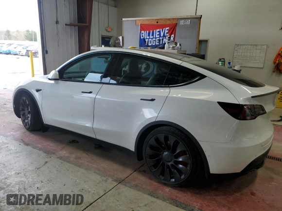 2022 Tesla Model Y Performance with VIN 7SAYGDEF9NF405370, listed as a Copart auction lot 43621095 with 52,292 mi miles and Salvage Title. Bid and sale history available at DreamBid. Image 2.