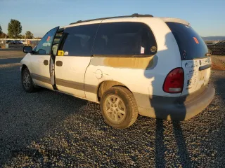 1997 Dodge Caravan Sport with VIN 2B4GP4433VR257427, listed as a Copart auction lot 77867534 with 277,510 mi miles and Salvage Title. Bid and sale history available at carsss.com. Image 2.