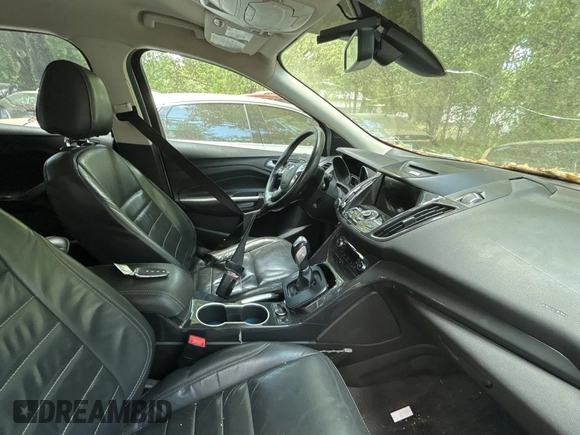 2016 Ford Escape Titanium with VIN 1FMCU9JXXGUC33190, listed as a Copart auction lot 51374865 with 222,129 mi miles and Clean Title. Bid and sale history available at carsss.com. Image 5.