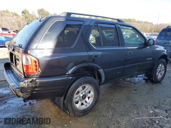 2003 Isuzu Rodeo with VIN 4S2CK58W334306303, listed as a Copart auction lot 83820444 with 180,040 mi miles and Salvage Title. Bid and sale history available at DreamBid. Image 3.