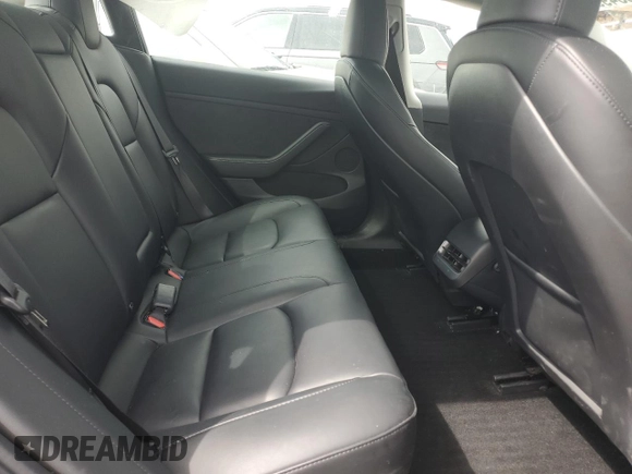 2023 Tesla Model 3 с VIN 5YJ3E1EA8PF620063, выставлен на аукционе Copart как лот 52534995 с пробегом 22 782 миль миль и Списание • Salvage title. История ставок и продаж доступна на DreamBid. Изображение 11.