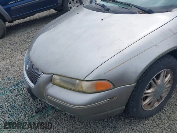 1998 Chrysler Cirrus LXi z VIN 1C3EJ56H0WN300229, wystawiony jako IAAI lot #42251263 z przebiegiem 191 491 mil mil oraz . Historia ofert i sprzedaży dostępna na DreamBid. Obrazek 6.