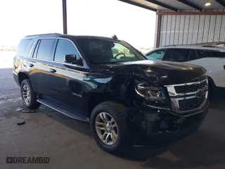 2016 Chevrolet Tahoe LT with VIN 1GNSCBKCXGR253990, listed as a IAAI auction lot 39675590 with 112,971 mi miles. Bid and sale history available at carsss.com. Image 1.