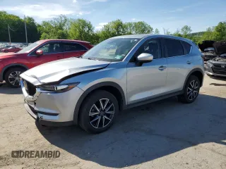 2018 Mazda CX-5 Touring z VIN JM3KFBCM2J0378122, wystawiony jako Copart lot #57819355 z przebiegiem 42 915 mil mil oraz Szkoda całkowita • Salvage title. Historia ofert i sprzedaży dostępna na DreamBid. Obrazek 1.