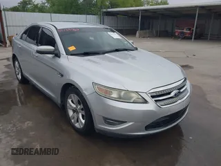 2011 Ford Taurus SEL with VIN 1FAHP2EW1BG117660, listed as a IAAI auction lot 42133767 with 204,965 mi miles and . Bid and sale history available at DreamBid. Image 1.