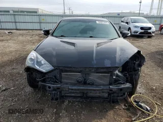 2013 Hyundai Genesis Coupe Track z VIN KMHHU6KJ4DU089727, wystawiony jako Copart lot #50002495 z przebiegiem 99 869 mil mil oraz Szkoda całkowita • Salvage title. Historia ofert i sprzedaży dostępna na DreamBid. Obrazek 5.