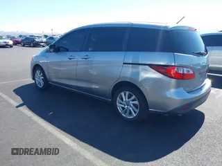 2015 Mazda 5 Sport z VIN JM1CW2BL3F0185779, wystawiony jako IAAI lot #42609991 z przebiegiem 158 403 mil mil oraz . Historia ofert i sprzedaży dostępna na DreamBid. Obrazek 3.