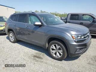 2018 Volkswagen Atlas SE with VIN 1V2CR2CA7JC563628, listed as a Copart auction lot 53817815 with 128,292 mi miles and Salvage title. Bid and sale history available at DreamBid. Image 4.