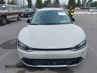 2022 Kia EV6 Wind with VIN KNDC34LA9N5043553, listed as a IAAI auction lot 41576789 with 133,401 mi miles and . Bid and sale history available at DreamBid. Image 12.