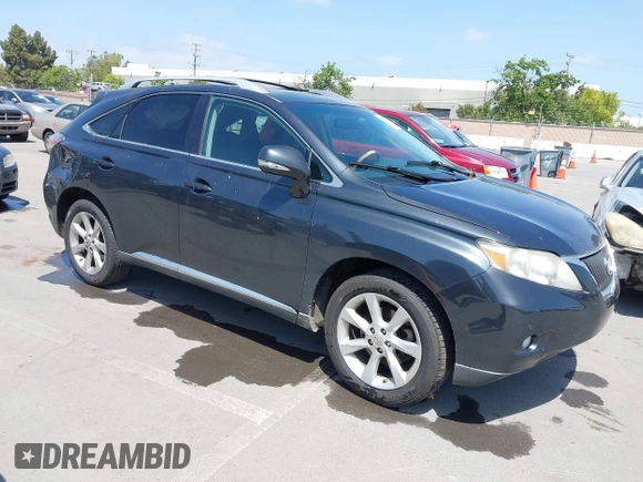 2010 Lexus RX 350 with VIN 2T2BK1BA8AC061209, listed as a IAAI auction lot 42105424 with 242,961 mi miles. Bid and sale history available at carsss.com. Image 1.