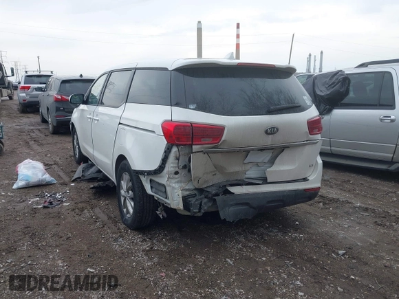 2021 Kia Sedona LX with VIN KNDMB5C19M6662112, listed as a IAAI auction lot 41684140 with 57,874 mi miles. Bid and sale history available at carsss.com. Image 3.