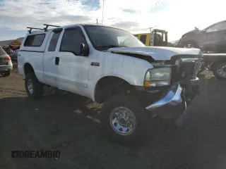 2003 Ford Super Duty F-250 XL with VIN 1FTNX21L83EB37779, listed as a Copart auction lot 77220014 with 160,011 mi miles and Salvage Title. Bid and sale history available at carsss.com. Image 4.