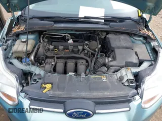 2012 Ford Focus SE with VIN 1FAHP3F24CL336350, listed as a IAAI auction lot 41882948 with 153,238 mi miles. Bid and sale history available at carsss.com. Image 10.