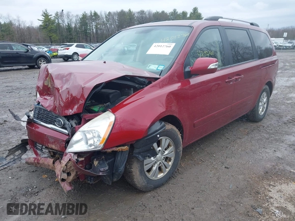 2012 Kia Sedona LX with VIN KNDMG4C72C6493162, listed as a IAAI auction lot 42012760 with 158,433 mi miles. Bid and sale history available at carsss.com. Image 2.