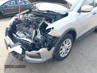 2017 Nissan Rogue SV with VIN KNMAT2MV7HP565670, listed as a IAAI auction lot 42435654 with 99,114 mi miles and . Bid and sale history available at DreamBid. Image 6.