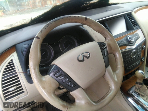 2012 Infiniti QX56 7-passenger z VIN JN8AZ2NE1C9018733, wystawiony jako IAAI lot #42046801 z przebiegiem 186 509 mil mil oraz . Historia ofert i sprzedaży dostępna na DreamBid. Obrazek 6.