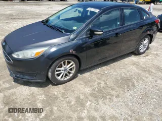 2016 Ford Focus SE with VIN 1FADP3F20GL297826, listed as a Copart auction lot 59877085 with 130,990 mi miles and Salvage title. Bid and sale history available at DreamBid. Image 1.