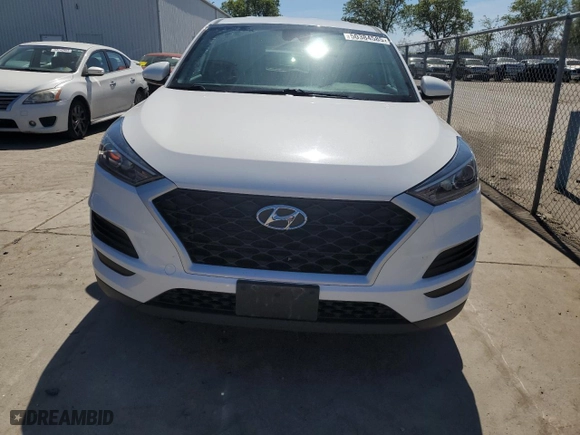 2019 Hyundai Tucson SE with VIN KM8J23A45KU028188, listed as a Copart auction lot 50384585 with 35,383 mi miles and Salvage Title. Bid and sale history available at carsss.com. Image 5.